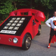 Illustration for article titled Phone Car Works Parades, Gets Good Reception